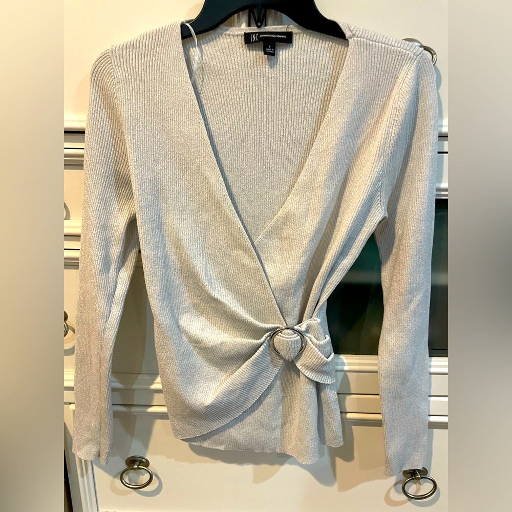 INC. size L, silver shimmery sweater. new without tags. Faux wrap.
